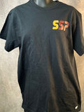 Black t-shirt with 'SSP' logo on a mannequin against a textured gray background